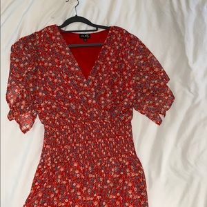 Red floral dress with smocked middle